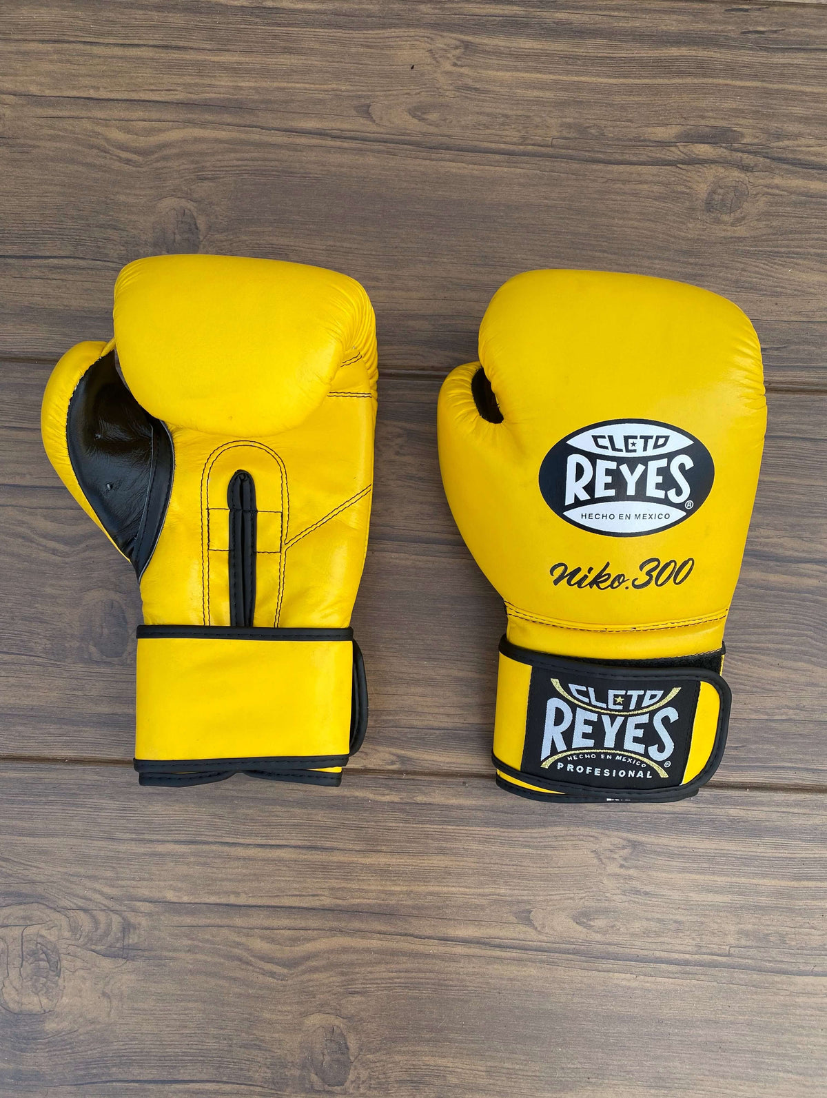 Cleto Reyes Boxing Gloves Yellow/Black Curved Leather Gloves Front View