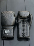 Fiest Panther Style Black Boxing Gloves - Front view showing intricate panther print design and Fiest Gloves logo on the wrist strap.