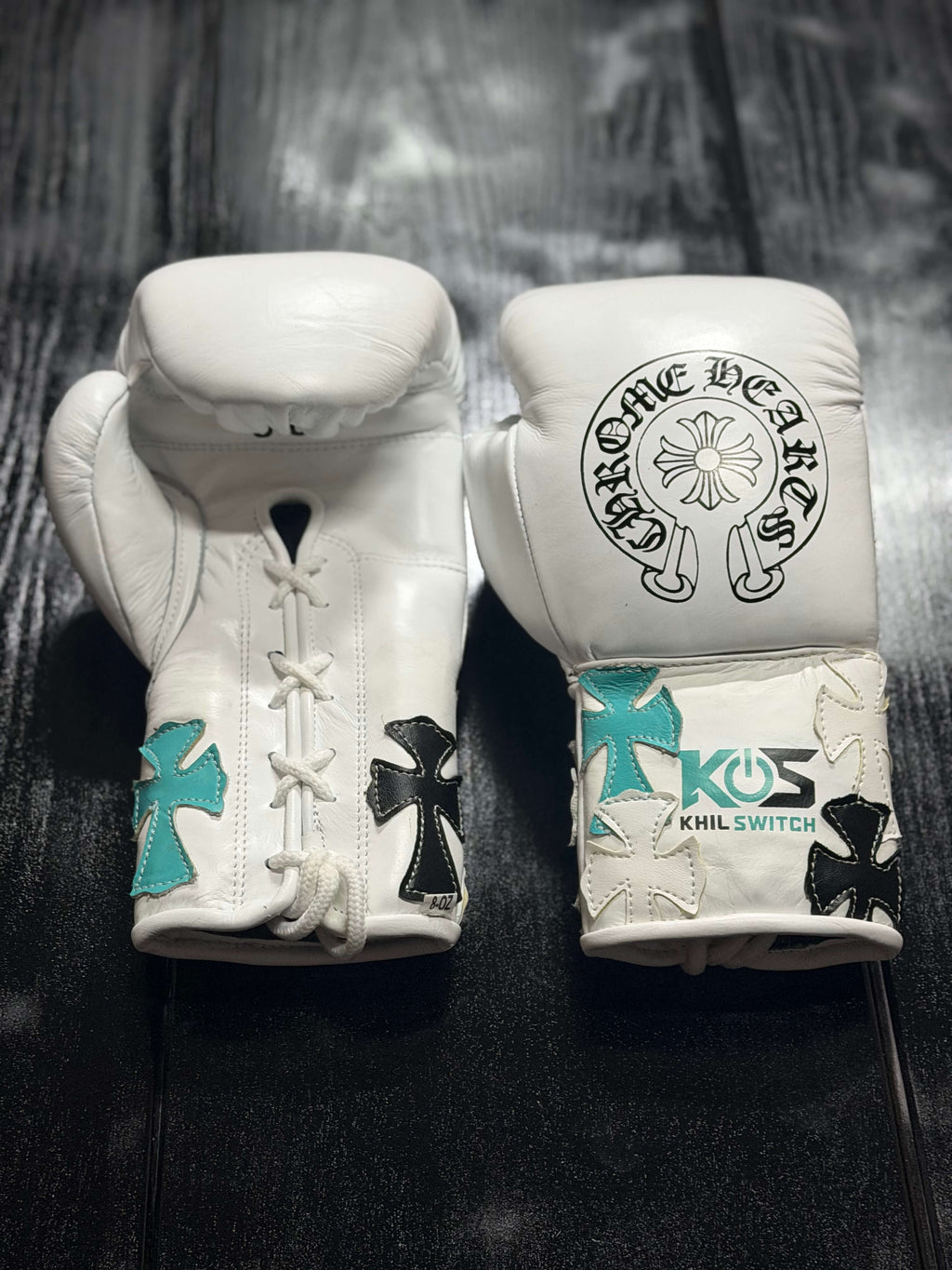 Winning Boxing Gloves White/Black/Teal Chrome Heat Style Leather Gloves Front View