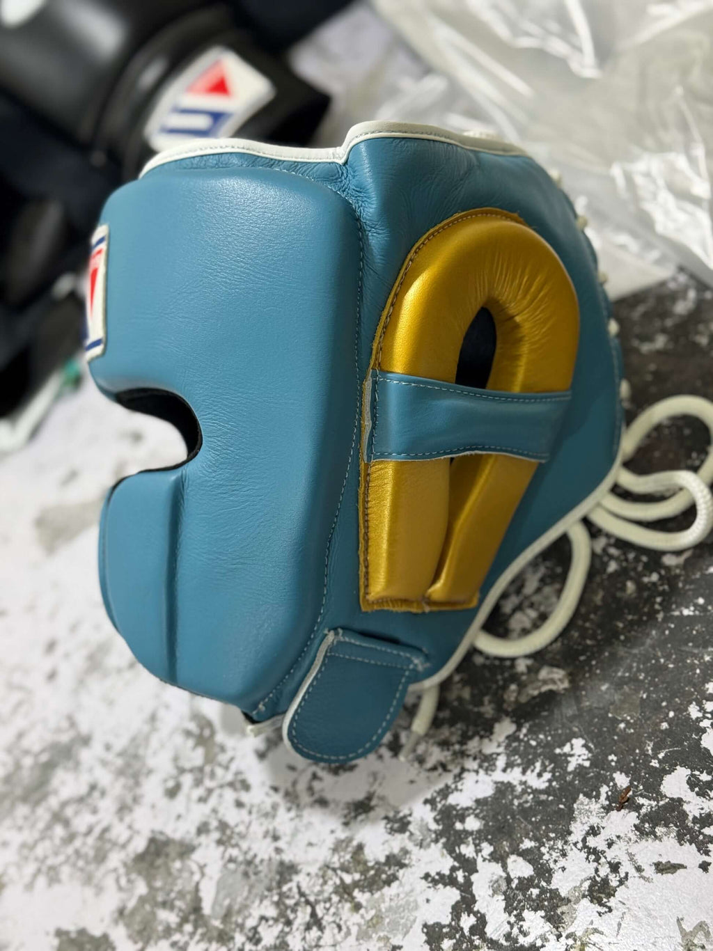 Winning Sky-Blue/Gold Leather Headgear Custom Fit Boxing Headguard Side View