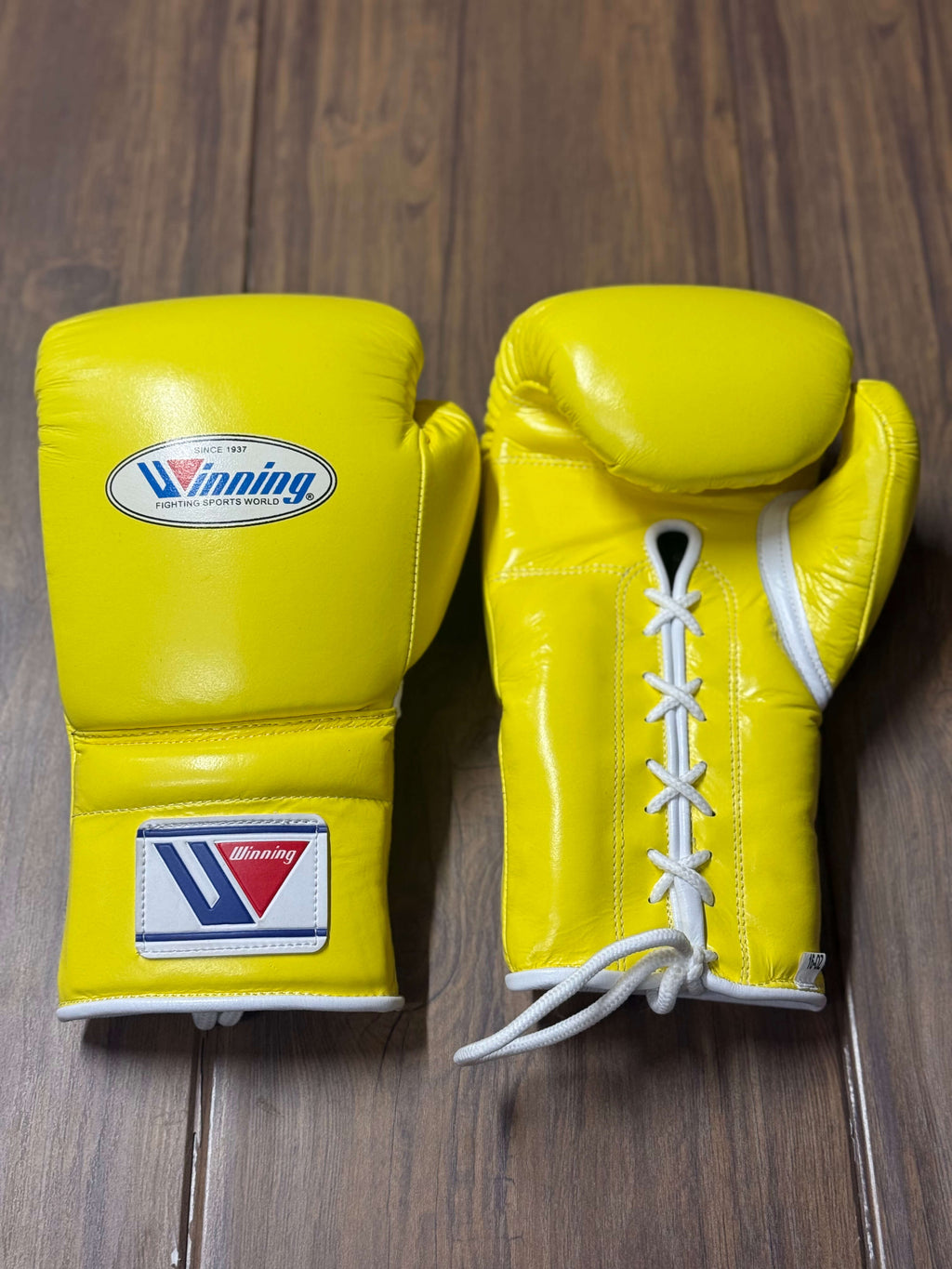 Winning boxing gloves yellow front and back for heavy bag and sparring