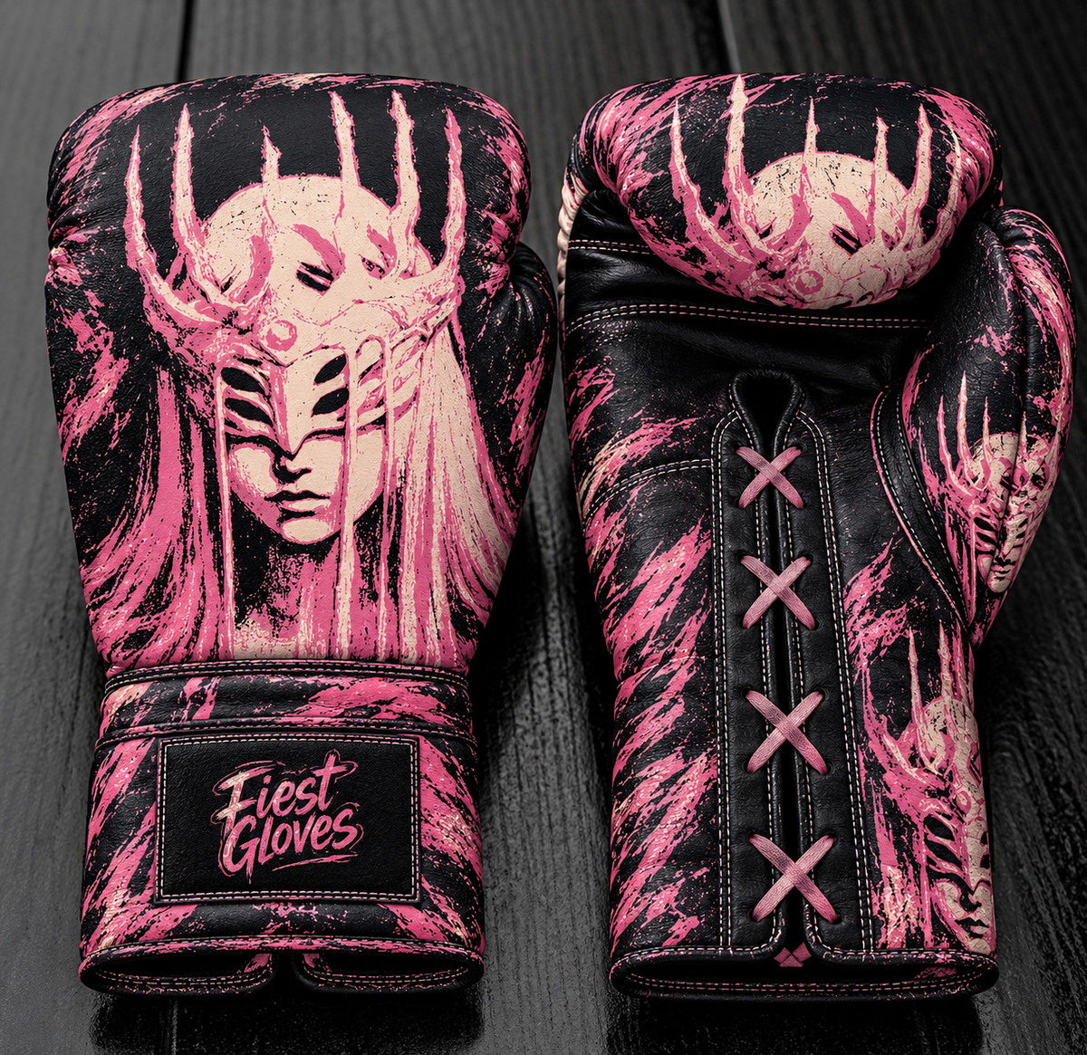 Fiest Gloves custom black and pink leather boxing gloves featuring a dark fantasy masked warrior queen with a spiky crown and lace-up closure.